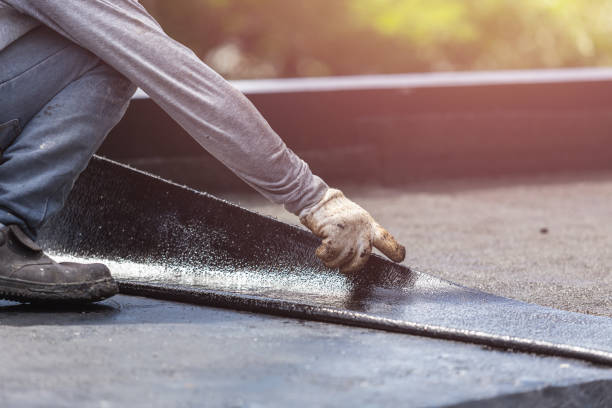 Professional Exterior Waterproofing technician working in Hilton, NY